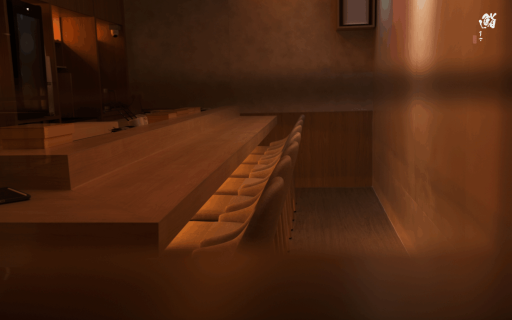 Best Omakase Singapore : Minimalist omakase counter with wooden interiors and soft ambient lighting