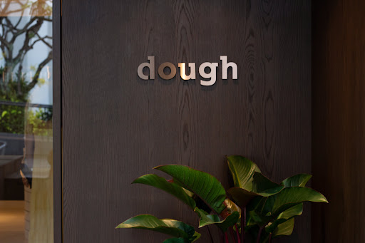 Cafe Beyond the Bean : Warm lighting and thoughtful decor enhancing Dough Supply Co’s ambiance