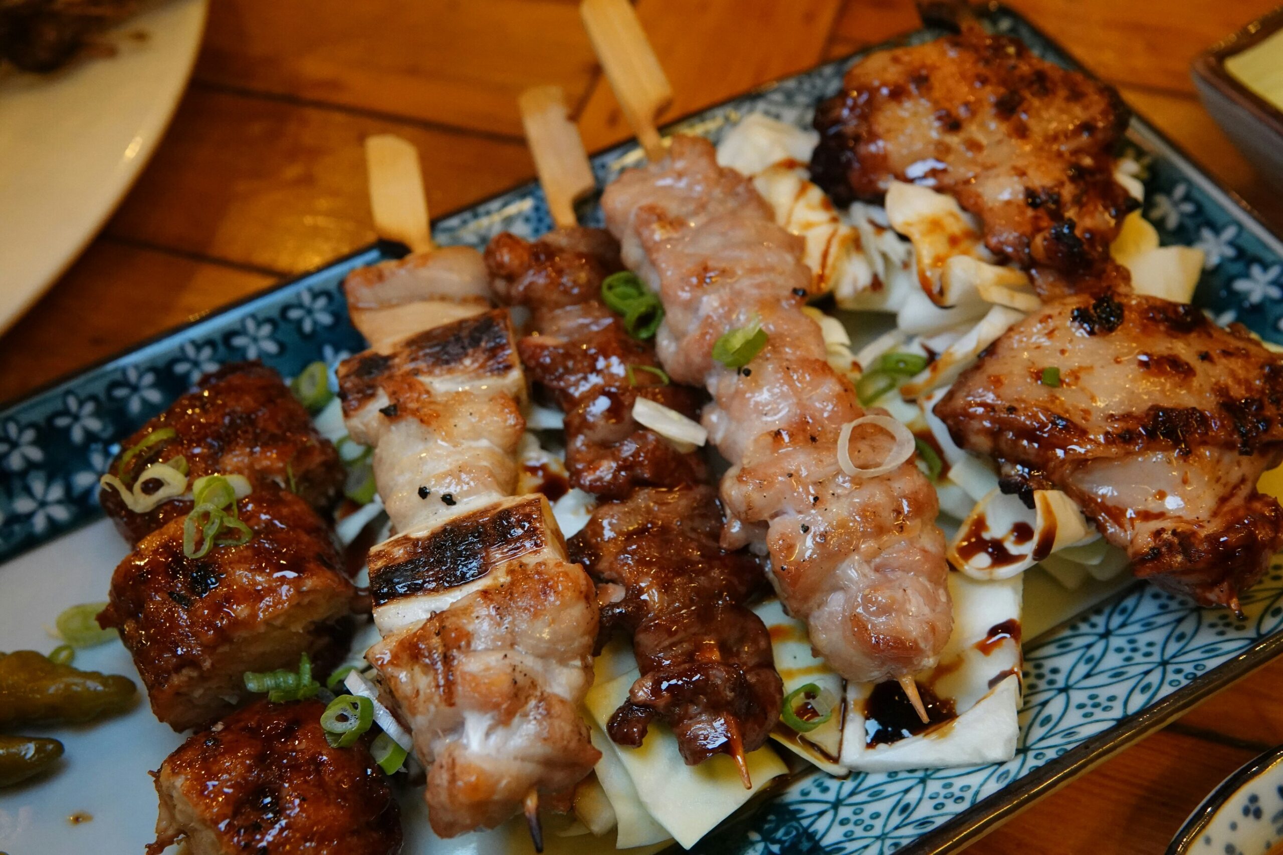 Fortune Centre Food: A platter of assorted yakitori skewers chicken and leeks served at a cosy Fortune Centre izakaya.