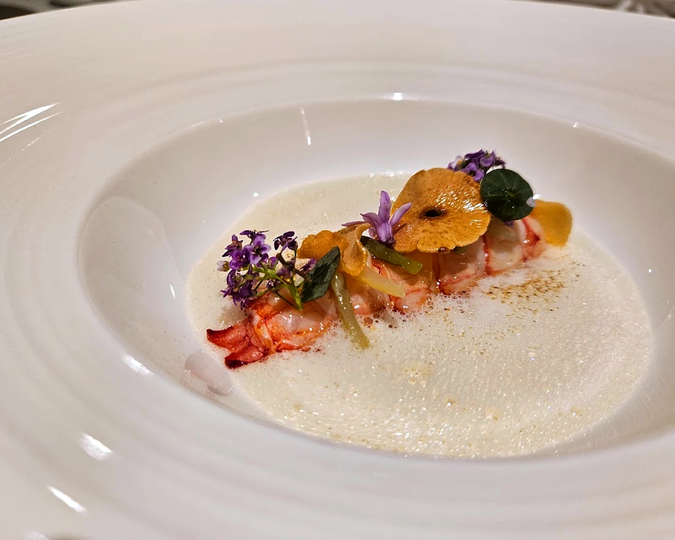 A sophisticated Italian dish crafted with precision, representing Michelin-starred quality, highlighting the artistry and excellence of fine Italian cuisine