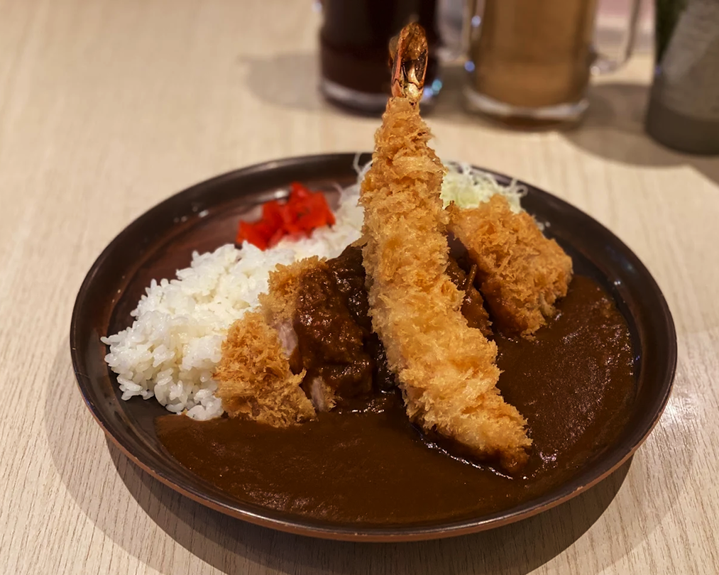 premium katsu set at Katsuya, featuring crispy breaded cutlet paired with Japanese curry and rice.