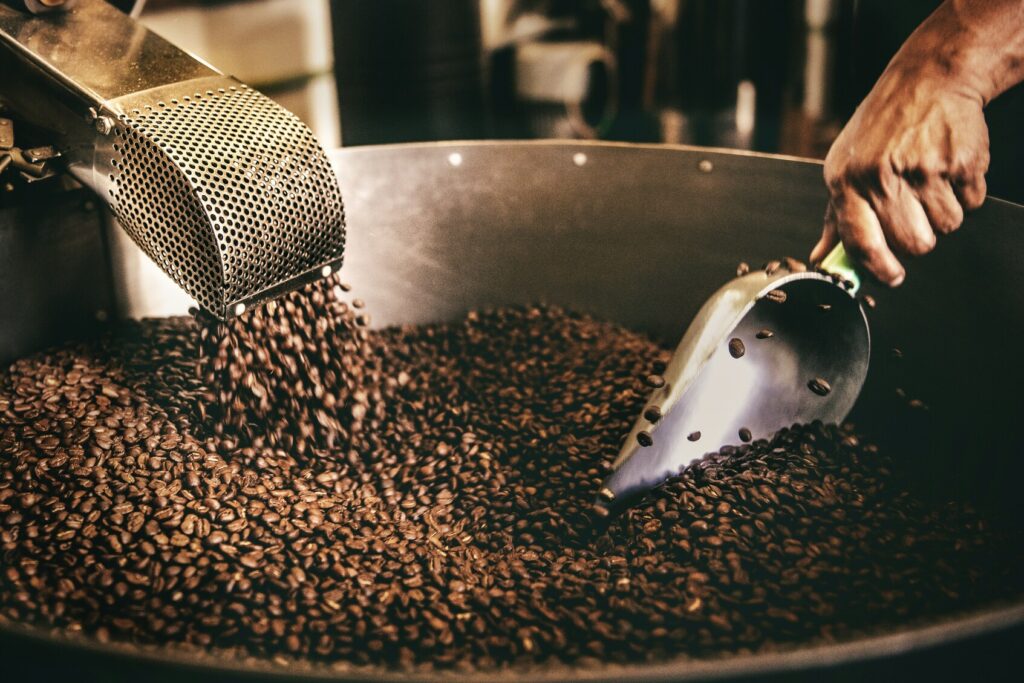 An image representing Singapore’s coffee bean heritage, showcasing traditional beans, roasting tools, and cultural elements connected to local coffee histor