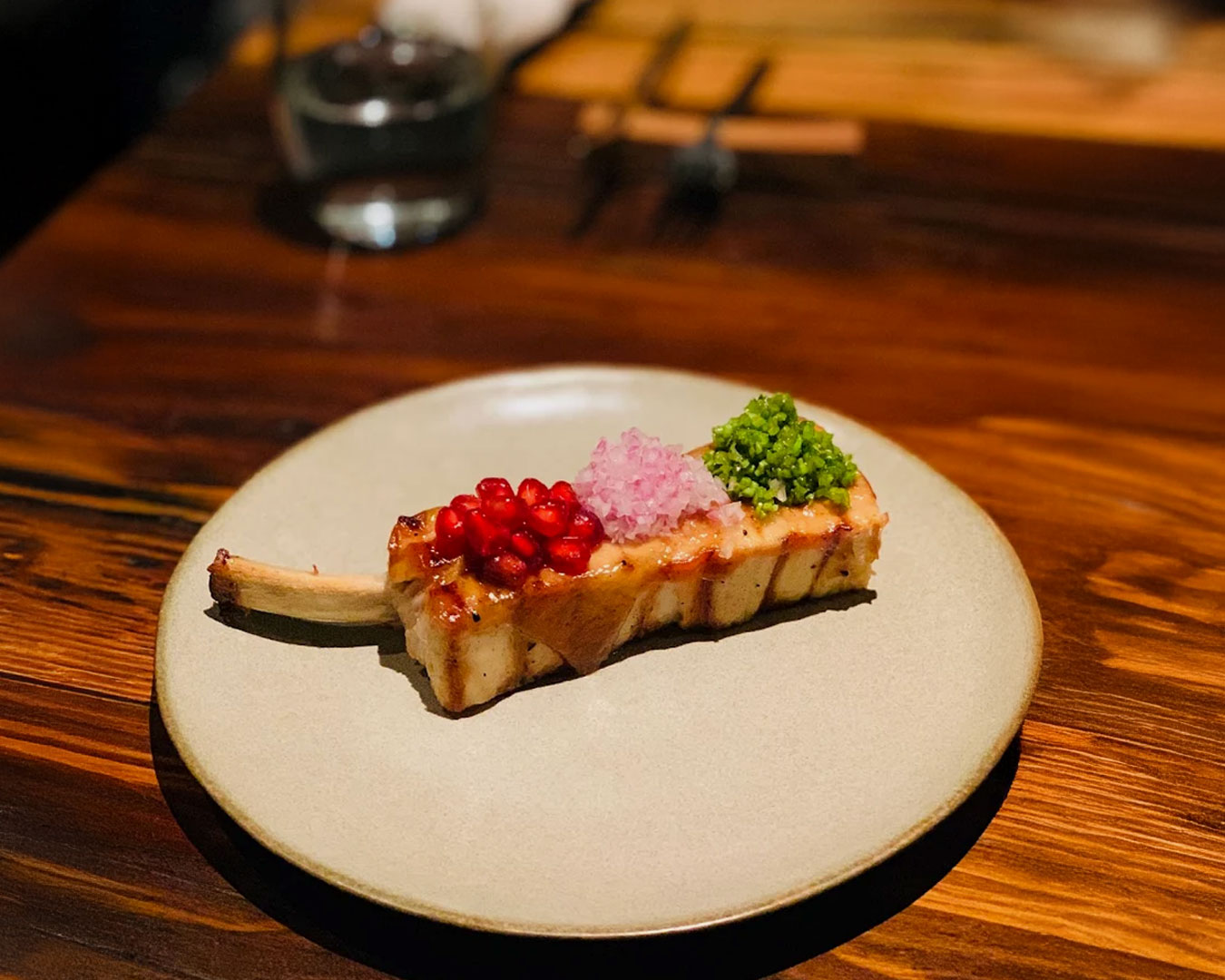 A meticulously plated fusion dish at Gaa Restaurant, blending Indian culinary heritage with modern fine-dining artistry. The presentation highlights refined textures, warm earthy tones, and thoughtful composition that reflects tradition reimagined through a contemporary lens