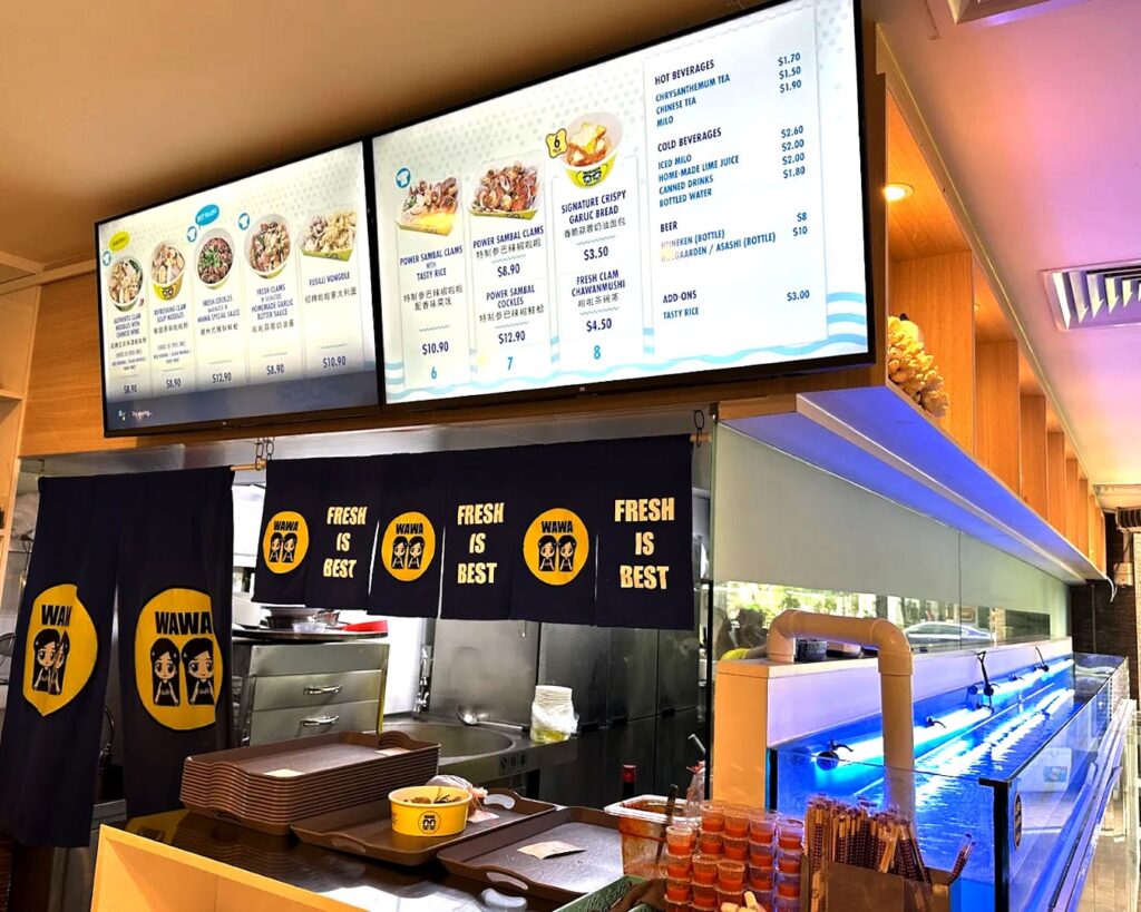 The menu board at Wawa Lala Bee Hoon in Fortune Centre, listing different lala bee hoon options with prices and simple dish descriptions.