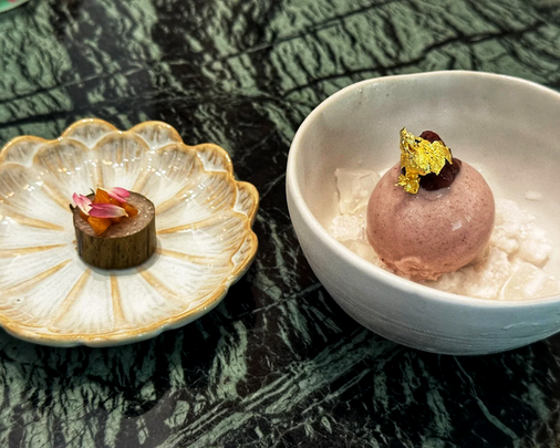 A delicate plated dessert at Candlenut, thoughtfully crafted with fine textures and subtle colours, offering a refined finish to the Peranakan dining experience.