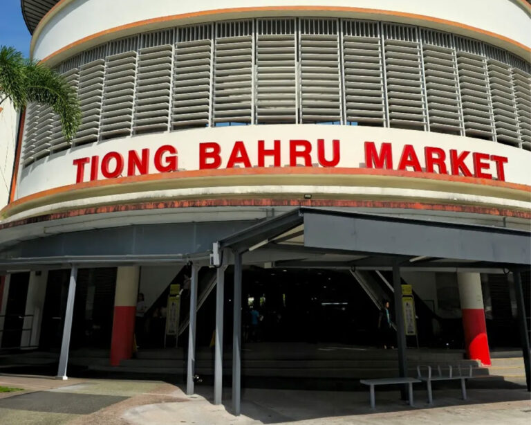 The exterior of Tiong Bahru Market, showcasing its iconic modernist architecture and open-air design, a well-known local landmark in Singapore’s heritage neighbourhood.